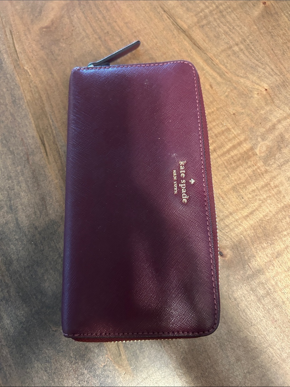 kate spade Plum Saffiano Zip Wallet with Gold Logo